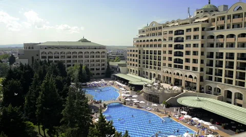 Resort with a nice pool and seagulls flying around. Stock Footage 66809720