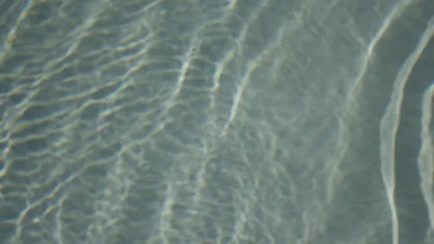Resort Package 121 | closeup of crystal clear blue resort tropical pool water Stock Footage 118525264