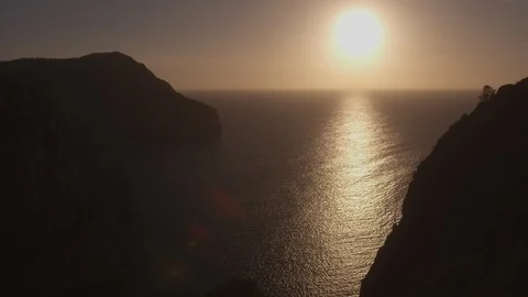 Resort Package 144 | dynamic sunset sunrise purple sky mountain ocean sea view Stock Footage 118526038