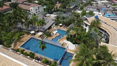 A resort with pool from a drone Stock Footage 194381782