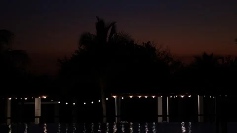 Resort Pool in Low Sunset Light Stock Footage 306016601