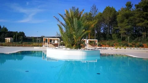 Resort. Pool, Palm Trees, Blue Stock Footage 99568556