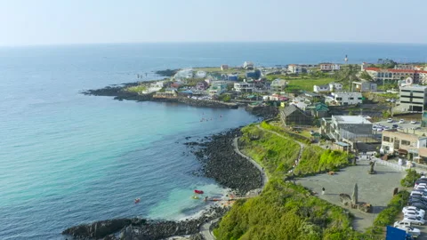 A resort where you can see the emerald sea and cafes. Jeju Island Handam Beach. Stock Footage