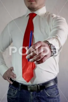 A respectable man in a business style in a white shirt with a red tie and large Stock Photos