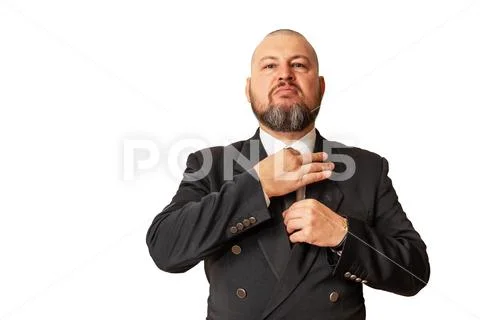 Respectable man demonstrates its superiority by adjusting the necktie. Stock Photos