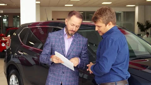 Respectable men finalize a contract with a firm handshake Stock Footage 311937691