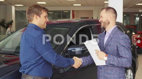 Respectable men study the details of the contract Stock Photos