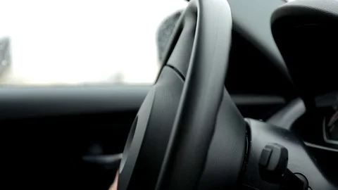 Respectable, responsible man driving car.  the man holds the steering wheel.  Stock Footage 81305838
