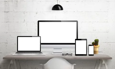 Responsive devices on desk with isolated screen for mockup. Computer display, Stock Photos