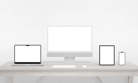 Responsive devices display on a work desk  computer, phone, tablet, laptop Stock Photos