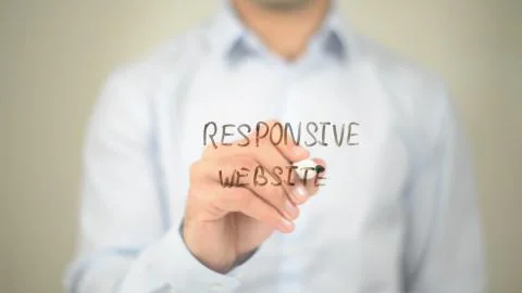 Responsive Website, Man Writing on Transparent Screen Stock Photos