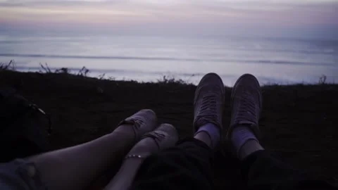 Rest on the edge of a cliff under which the waves of the sea beat. Stock Footage 154160003