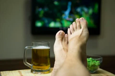 Rest in the evening of a bachelor. Stock Photos