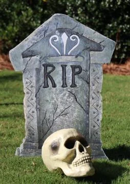 Rest in Peace Tombstone with Skull Stock Photos