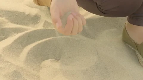 Rest on the sea.Sand slips through your fingers.Summer light mood. Stock Footage 235890549