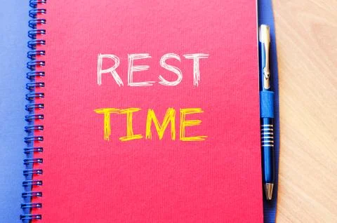 Rest time write on notebook Stock Photos