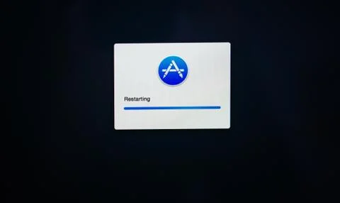Restarting message with Apple Computers OS App Store Stock Photos
