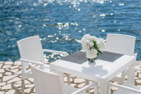 Restauran table on a seaside Stock Photos