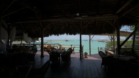 Restaurant and bar under a thatched roof in The Dominican Republic Stock Footage 50388719
