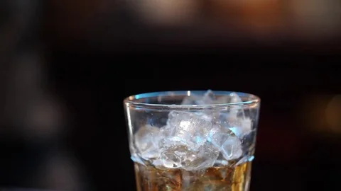 Restaurant bartender preparing whiskey poured hotel restaurant bar. Stock Footage 81841338
