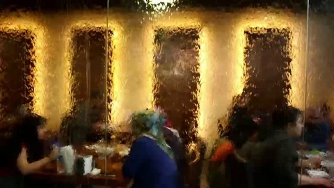 A restaurant behind the waterfall 2 Stock Footage 94174869