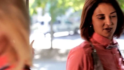 The restaurant bruptly includes two charismatic girls Stock Footage 80844390