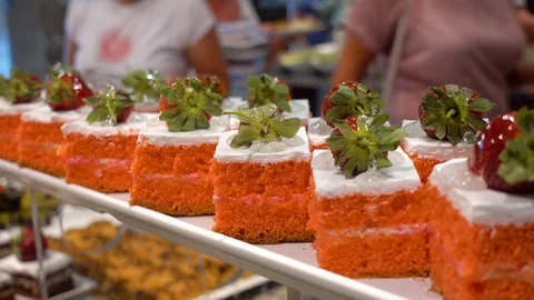 Restaurant Buffet. In the foreground there are plates with dessert. Stock Footage 92008149