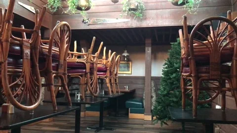 Restaurant Chairs Stacked on Tables Stock Footage 103226733