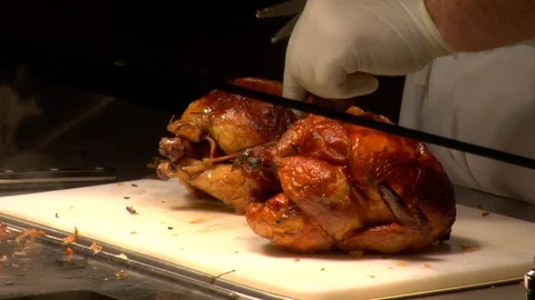 Restaurant chef carving dinner meat chicken and turkey Video stock 125344772