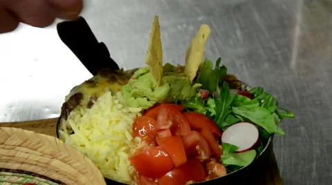 Restaurant chef serving mexican dish Stock Footage