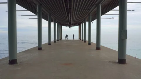 A restaurant on columns by the sea on the pier Stock Footage 143805791