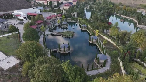 Restaurant complex with a lake in front of it 1 Video stock 337320441