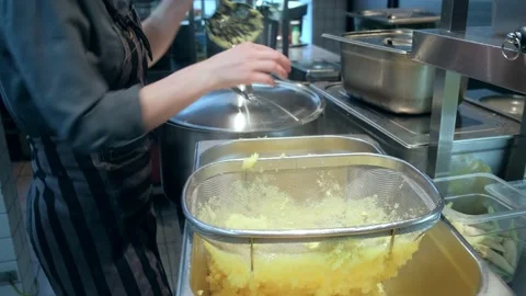 Restaurant cuisine. The chef is preparing mashed potatoes. Boiled potatoes Stock Footage 171682529