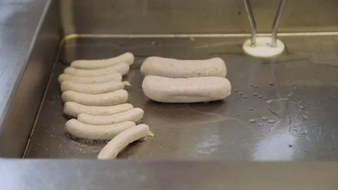 Restaurant cuisine, process of cooking and roasting sausages. Stock Footage
