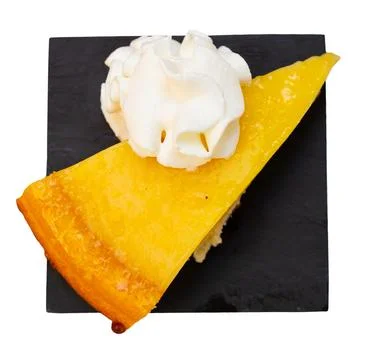 Restaurant dessert on plate - triangular piece of catalan cream pie with caramel 스톡 사진