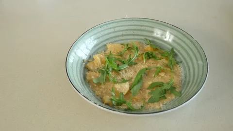 Restaurant dish - delicious risotto with caramelized pear and cheese 스톡 동영상 239929777