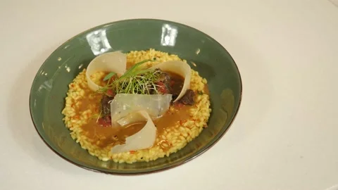 Restaurant dish - delicious risotto with vegetables and tender veal meat Stock Footage 240002793