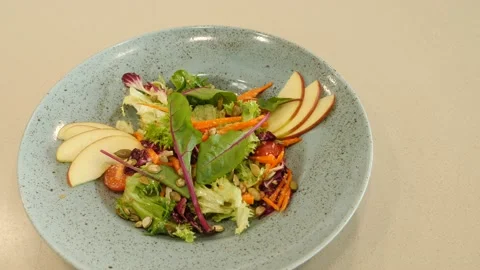 Restaurant dish - lean healthy and tasty salad 스톡 동영상 239932057