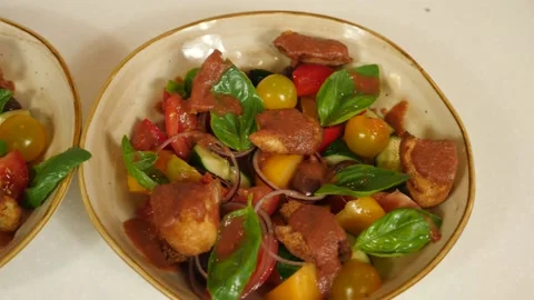 Restaurant dish - a mix of vegetables with tender meat and croutons Stock Footage 239945643