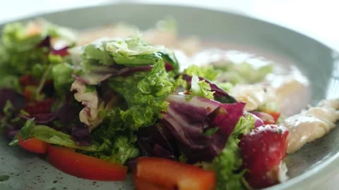 Restaurant dish - a mix of vegetables with tender chicken meat in a sour sauce Stock Footage 239945653