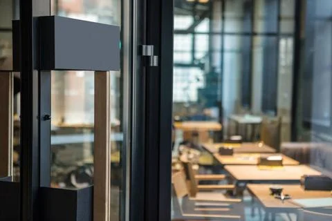 Restaurant door handle with pull sign on glass doors Front door in cafe an... Photos