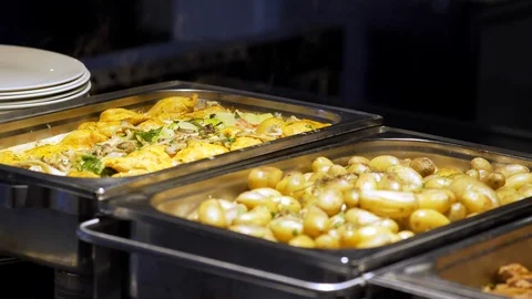 Restaurant guests select food from a buffet Stock Footage 91339760