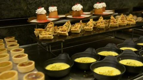 Restaurant guests select food from a buffet Video stock 96464967