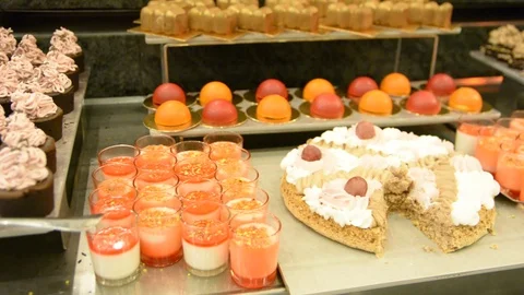 Restaurant guests select food from a buffet Video stock 96465044