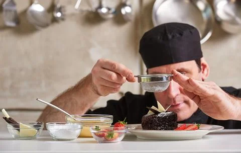 Restaurant hotel private chef preparing desert chocolate cake Stock Photos
