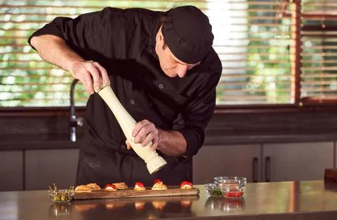 Restaurant hotel private chef preparing making canapes starters snacks Stock Photos