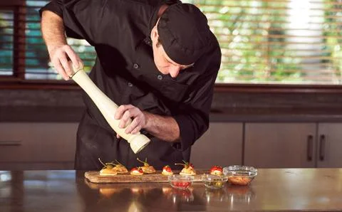 Restaurant hotel private chef preparing making canapes starters snacks Stock Photos