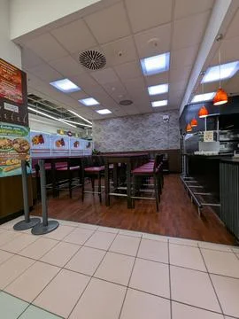 Restaurant interior empty seating area, in commercial dining space, main ac.. Stock Photos
