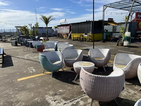 Restaurant interior featuring metal table and chair with panoramic view Stock Photos