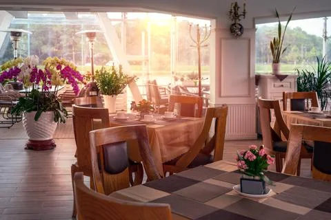 Restaurant interior with large windows Stock Photos
